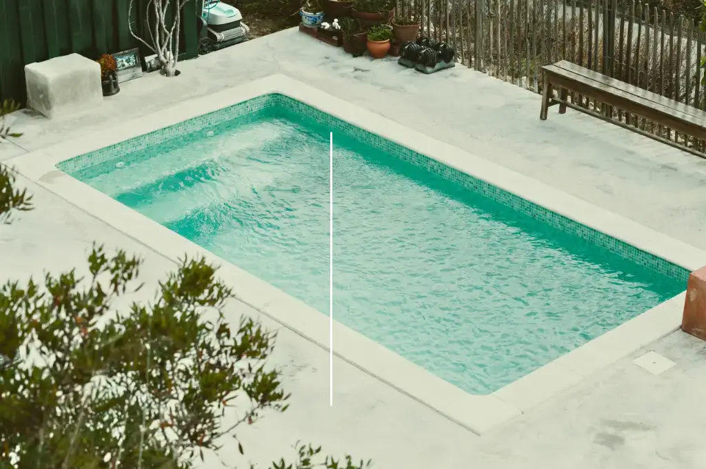 DIY fiberglass pool kit installed in a modern backyard with a clean and minimalist concrete surround.