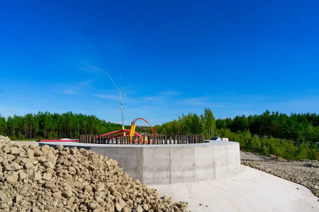 Construction site featuring a concrete foundation built for an above ground pool.