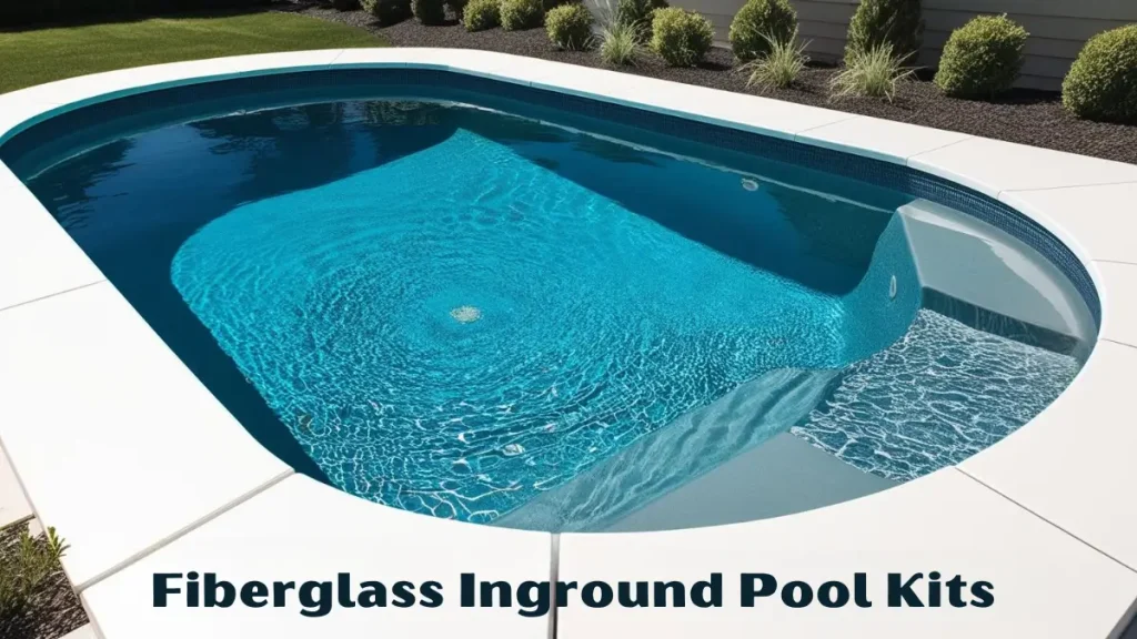 A beautifully installed fiberglass inground pool kits filled with crystal-clear water, surrounded by a white deck and lush landscaping.