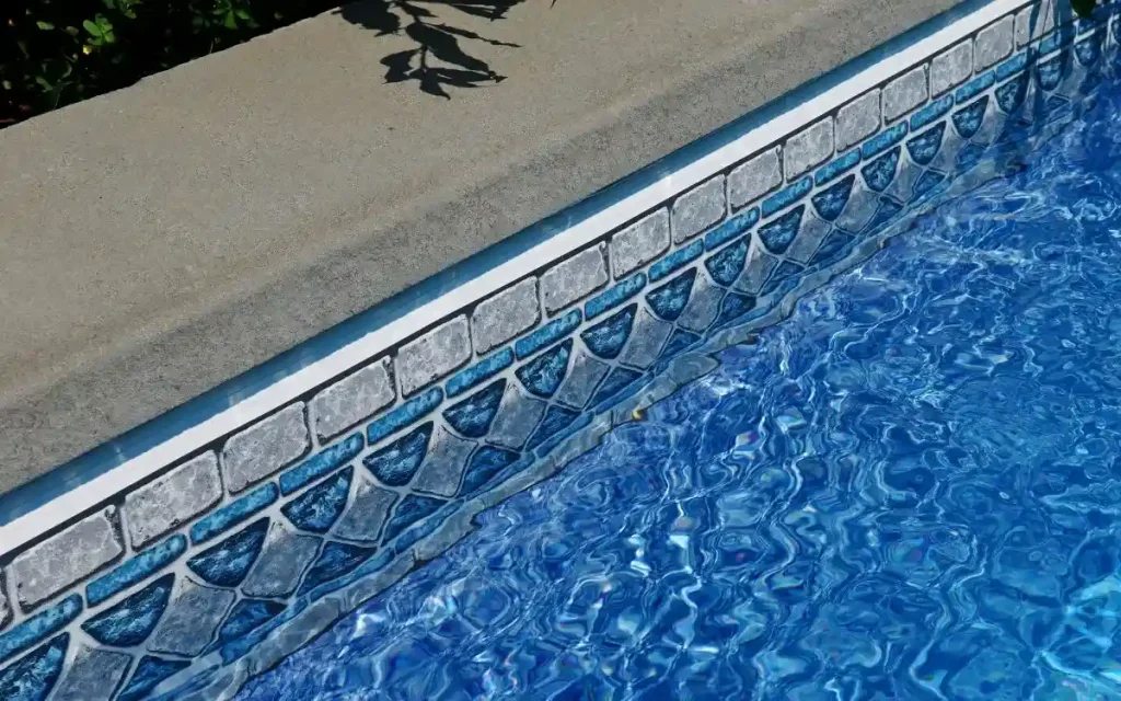 A vibrant fiberglass swimming pool tile with a glossy and non-slip surface.